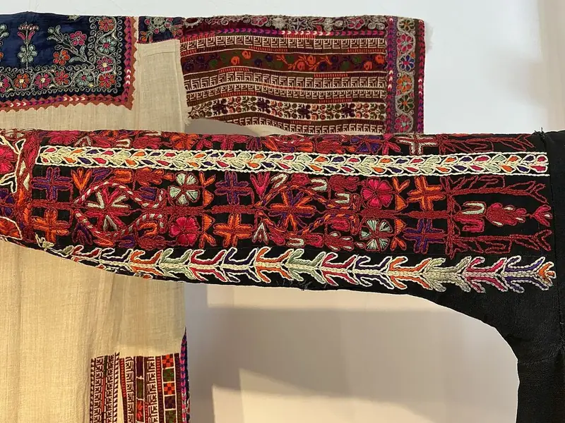 Embroidered dress sleeves.
