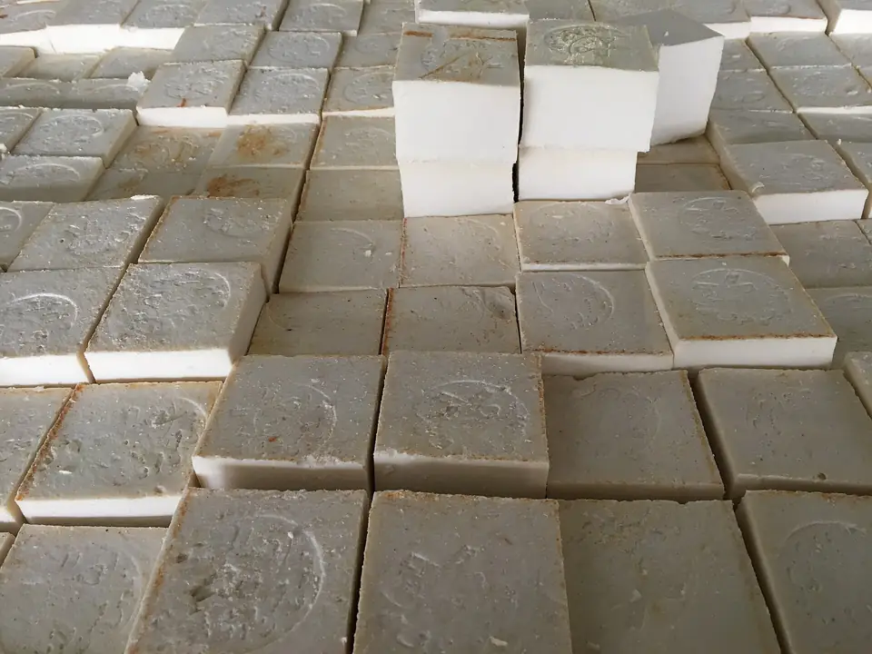 Bars of white soap stacked in rows to cure in a Nablus factory.