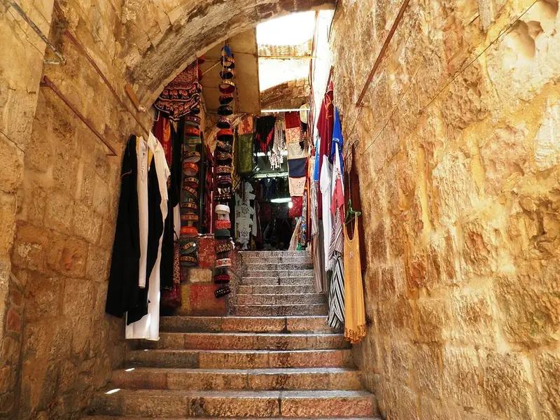 Shops along a stepped lane in the Old City of Jerusalem.