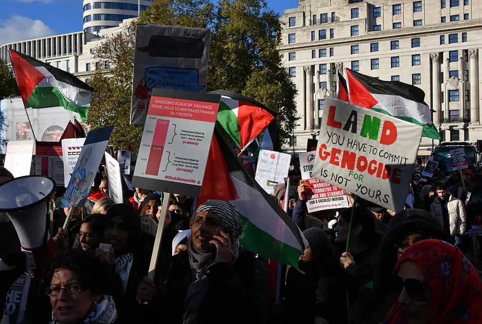 Marchers with flags and placards in London.